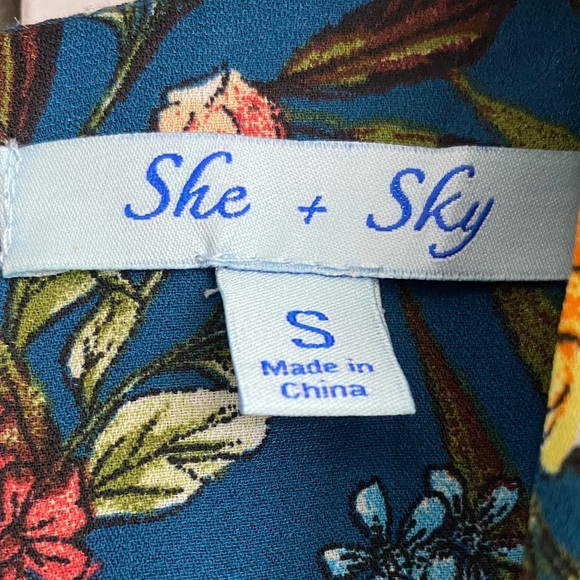 She + Sky Teal Floral Romper - Picture 2 of 7